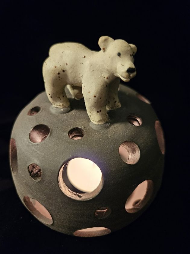 Candle Holder with curious Creatures