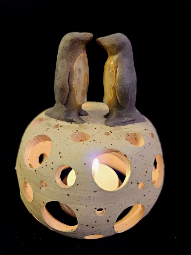 Candle Holder with curious Creatures