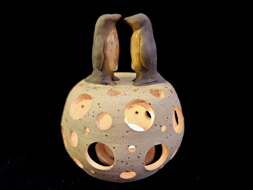 Candle Holder with curious Creatures