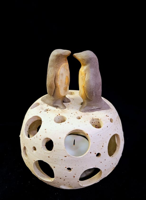 Candle Holder with curious Creatures