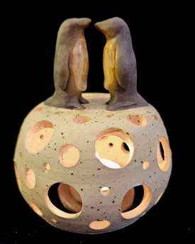 Candle Holder with curious Creatures