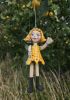foto: Little girl in yellow- puppet