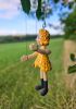 foto: Little girl in yellow- puppet