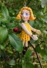 foto: Little girl in yellow- puppet